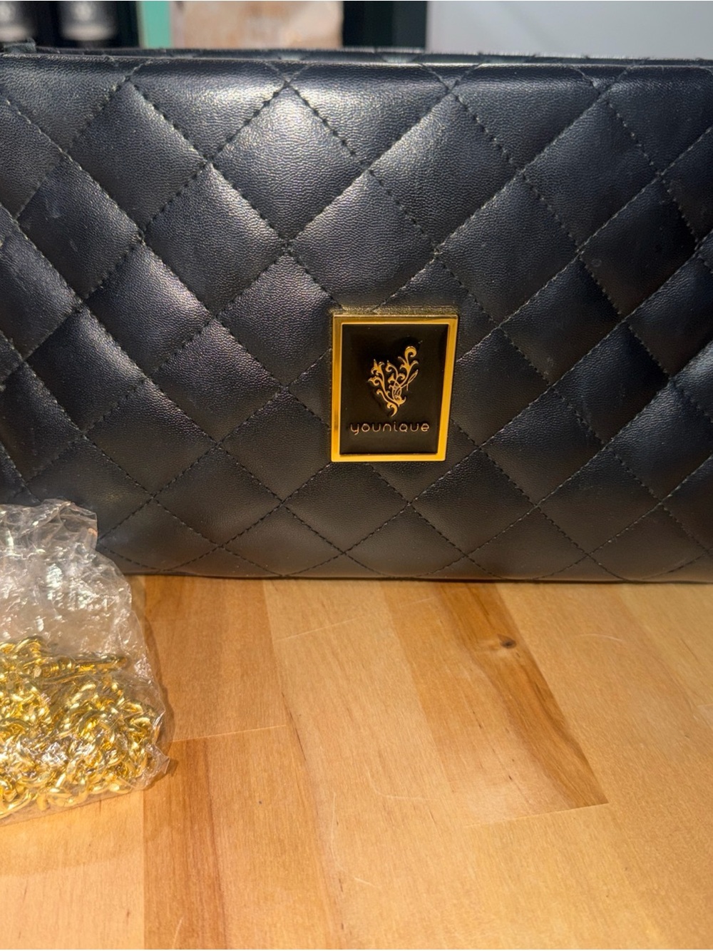 Younique Black Quilted Crossbody with Gold Emblem